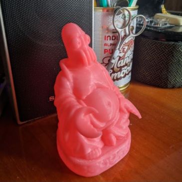 Zoidberg Buddha in red on table