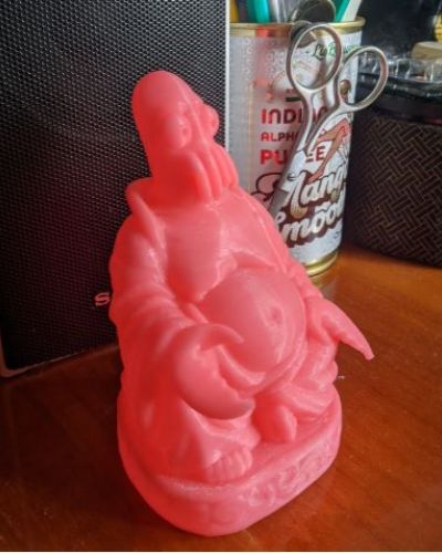 Zoidberg Buddha in red on table