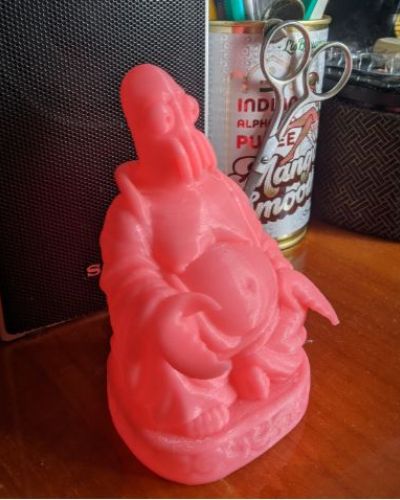 Zoidberg Buddha in red on table