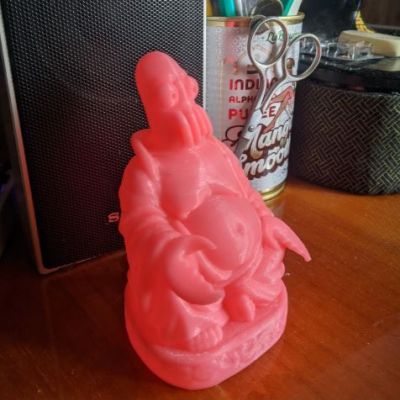 Zoidberg Buddha in red on table